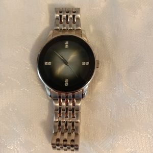 Armitron Unisex watch raised crystal dome face metal silver tone band